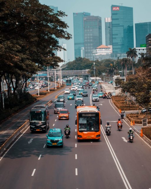 People driving to work in Indonesia