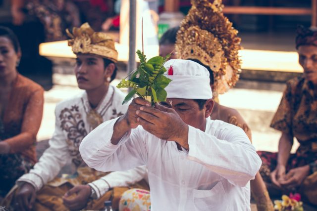 Indonesian people peforming Hindu ritual
