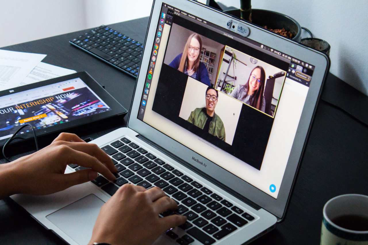 The Meiji Copywriting Team having a Zoom call and discussing upcoming projects