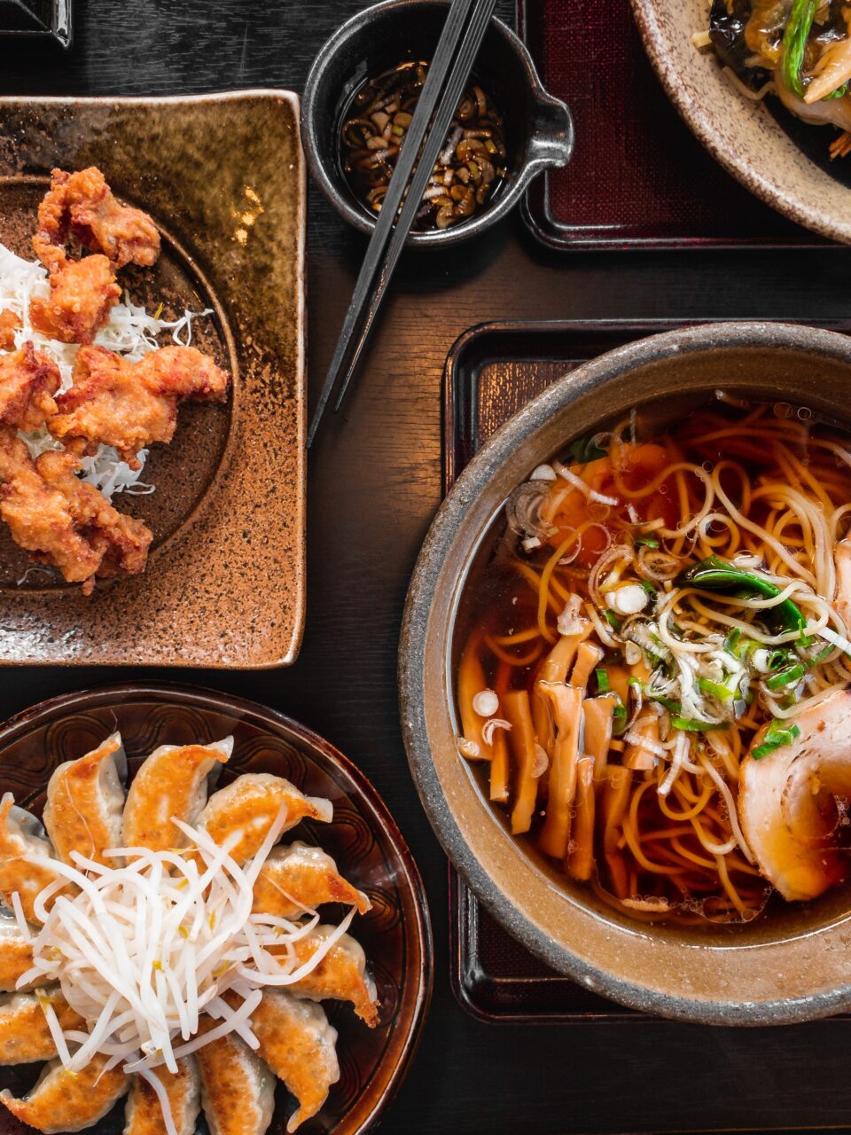 A table full of Japanese food.